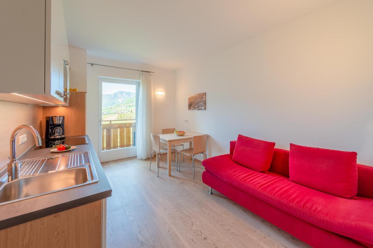 Sandhof Ferienwohnungen Termeno Esterno foto